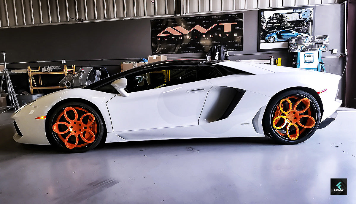 Stunning 20" & 21" Forged Rims on a Lamborghini Aventador, demonstrating the excellence of LOMA's craftsmanship.