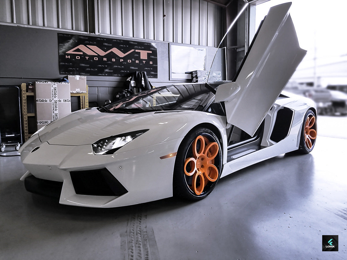 LOMA Forged™ custom wheels enhancing the dynamic appearance and performance of a Lamborghini Aventador.