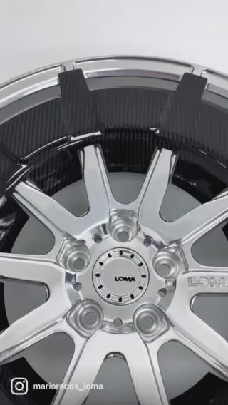 Aftermarket LOMA Forged wheels on a black C8 Corvette, highlighting the carbon fiber AERODISC